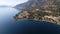 Serene Lakeside Community Aerial View with Mountains and Forest