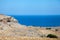 Serene landscape with rocky coast and calm sea