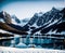 A serene landscape with snow-covered mountains in the background and a small lake in the foreground.