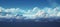 A serene and lovely blue sky background, adorned with soft white clouds gently floating...Peaceful Blue Sky with Clouds.