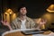 A serene male office employee sits at a desk, relaxing, doing yoga, practicing meditation to reduce stress, relieve