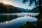 A serene and mist-covered lake nestled in a tranquil valley