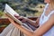 Serene Moments: Woman Lost in the Pages of a Book in the Park