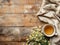 Serene morning with chamomile tea on rustic wooden background - top view