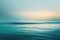 Serene ocean waves captured at sunset under a gradient sky