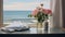 Serene Oceanic Vistas: A Pink Vase And White Towel On A Table