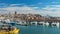 Serene panoramic view of old port in Genoa with cityscape