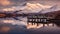 Serene Reflections of Snow-Capped Mountains on a Tranquil Lake