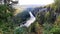 Serene River View Through Trees From a High Vantage Point at Dusk