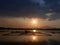 Serene, romantic and beautiful golden sunset over lake fishing farm at dawn.