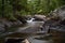 Serene Scenic Pike River Waterfall Through Large Granite Boulders Amberg Wisconsin