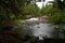 Serene Scenic Pike River Waterfall Through Large Granite Boulders Amberg Wisconsin with Large Open Water Area