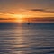 A serene sunrise over a calm ocean with a sailboat in the distance2, Generative AI