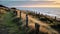 Serene Sunset Beach Scene With Stone Fence On English Moors