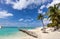 Serene turquoise Isla Mujeres beach Playa Norte famous for emerald waters, sandy sea shore and beach bars for fun and