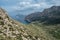 Serene valley nestled amidst majestic coastal cliffs in Mallorca