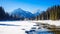 Serene winter scene with a snow-covered mountain and frozen lake