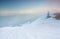 Serene winter sunrise on top of Feldberg mountain