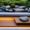 A serene Zen meditation space with a rock garden, bamboo water fountain, and floor cushions4