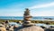 Serenity at the Beach: A Zen Stone Tower in Harmony with Nature