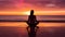 Serenity At Dusk: Woman Meditating In Yoga Pose On Beach