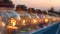 Serenity by the Sea: Closeup Macro of Candles in Ornate Glass Jars at Evening Sunset