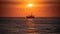 Serenity at Sea: A Vibrant Sunset over a Calm Ocean Horizon with Birds and Boat