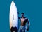 Serfer muscular man with neon surfboard isolated on blue. Male surf with fit body. Sexy surfer with a surf board. Summer