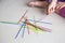 Series of kid playing pick up sticks fun game