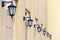 Series of lanterns on a yellow wall, Dubai