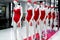 series of mannequins in red swimsuits. Sale