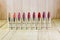 A series of multi-colored lipsticks