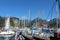 Series of sailboats and motorboat, dock at Lake Garda, Italy