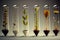 a series of test tubes with different types of seeds, each sprouting its own unique plant