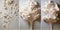 A series of three photographs of a tree with white flowers, AI