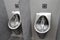 A series of urinals for the men`s public toilet, stainless steel urinals