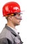 Serious architect in red hardhat