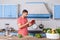 Serious attentive man in t-shirt scrolling tablet searching food recipe on internet to cook salad, vegan diet