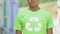 Serious boy in shirt with recycle sign promoting reusable products, awareness