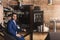 Serious businessman sitting at bar counter