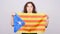 Serious catalan woman with estelada flag. Referendum For The Separation Of Catalonia From Spain