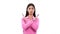 Serious Caucasian Woman Gesturing Stop with Crossed Arms on White Background