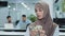 Serious concentrated eastern muslim girl in hijab office worker manager or accountant holding bundle of dollars in hands