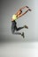 Serious dark-skinned female person demonstrating her jump