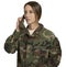 Serious female soldier talking on military telephone, communicating