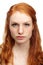 Serious, girl and woman with portrait, redhead and beauty isolated on a white studio background. Face, person and model