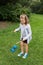 Serious little girl juggling a diabolo