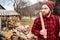 Serious lumberjack holding axe