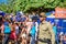 Serious policeman of Municipal Guard in sunglasses working during Bloco Orquestra Voadora, Carnaval 2017