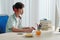 Serious Schoolboy Stuidying at Desk at Home